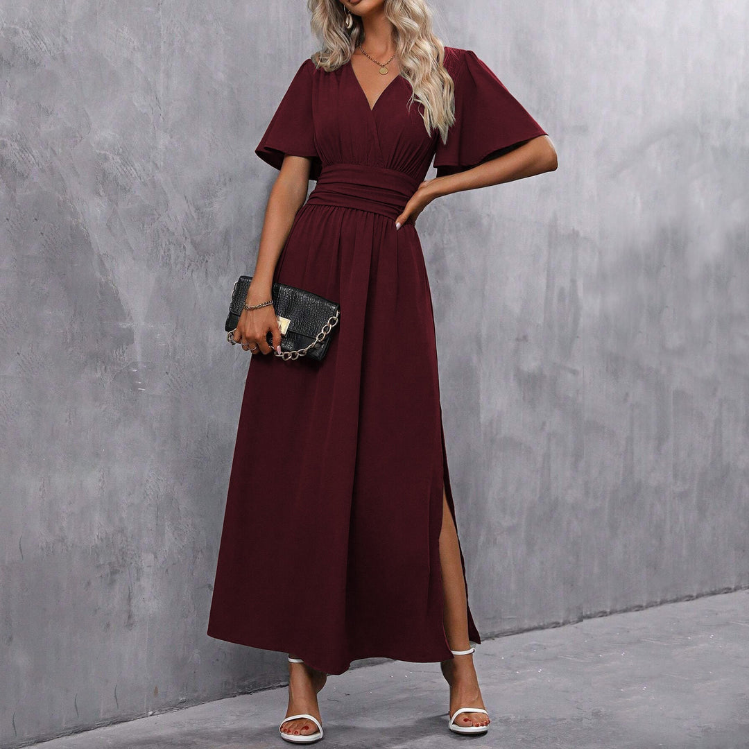 Júlia| Elegante vestido longo preto com decote em V, mangas transparentes e fenda